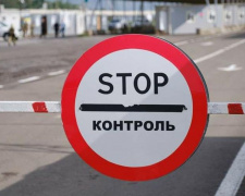 Обсервация в больнице: через КПВВ на Донбассе пропустили 17 человек, застрявших в «серой зоне» (ФОТО)