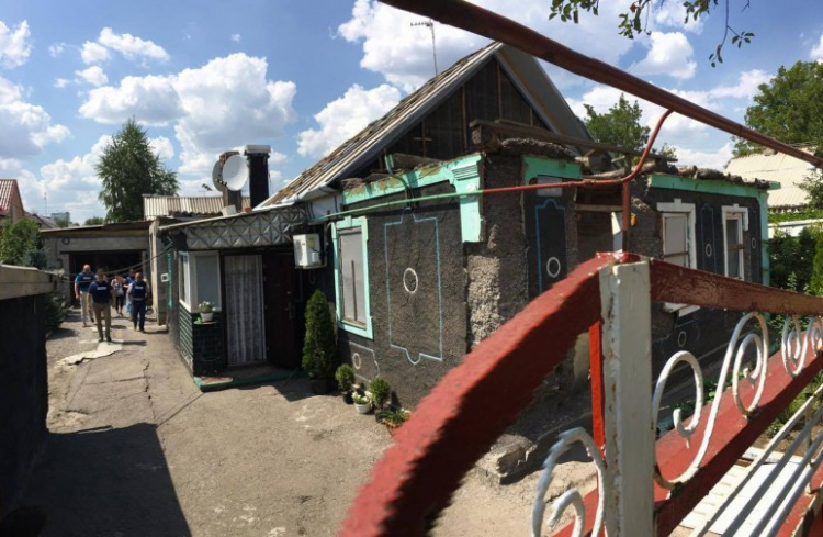 Жители Донецка отстраивают дома при поддержке ООН