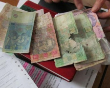 Мариупольцы смогут сдавать поврежденные банкноты в «Ощадбанк», «ПриватБанк» и «Райффайзен Банк Аваль»