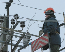 В Мариуполе 7 бригад электриков ликвидируют порывы  линий электропередачи