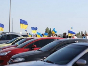 Мариупольцы День защитника Украины отпразднуют автопробегом и молебном
