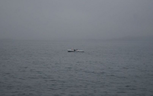 Почти сутки в открытом море близ Мариуполя ищут трех рыбаков