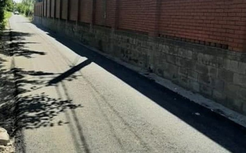 В Мариуполе заасфальтировали разбитую дорогу