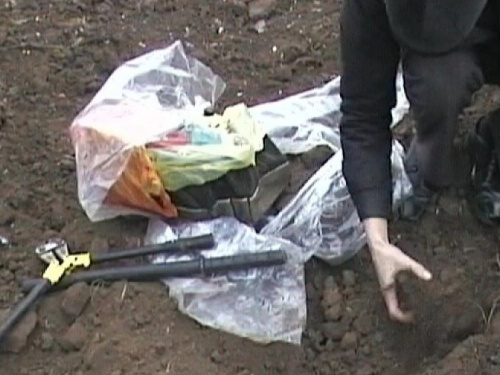 Житель Донецкой области проведет три года за решеткой из-за закопанного в огороде арсенала