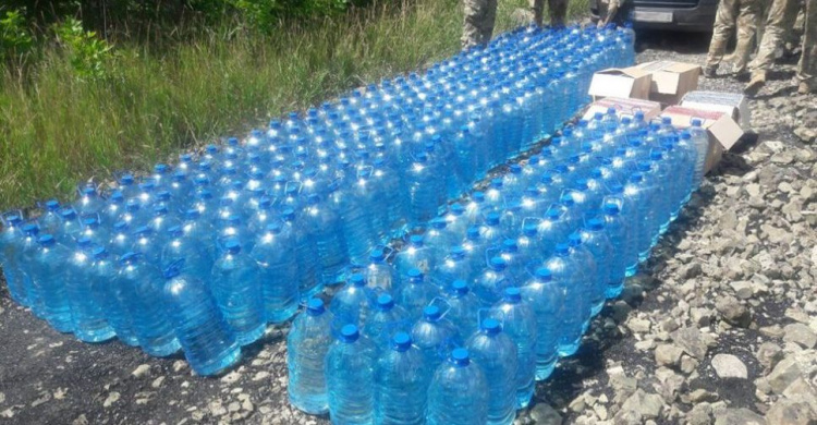 В зоне ООС на Донетчине в лесополосе нашли тонны спирта (ФОТО)
