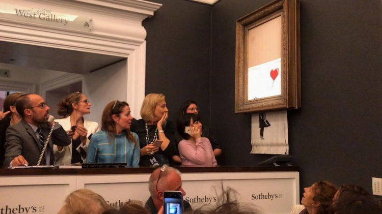 Картина скандального художника самоуничтожилась на аукционе, как только ее продали за миллион фунтов (ВИДЕО)