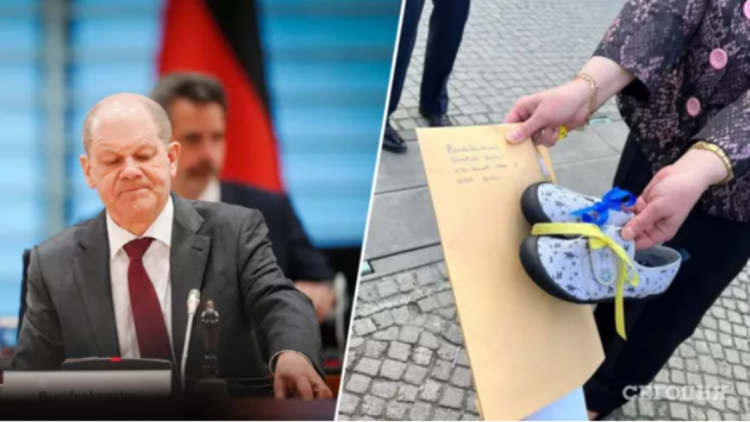 Ботинки погибшей в Мариуполе 6-летней девочки подарили канцлеру Германии